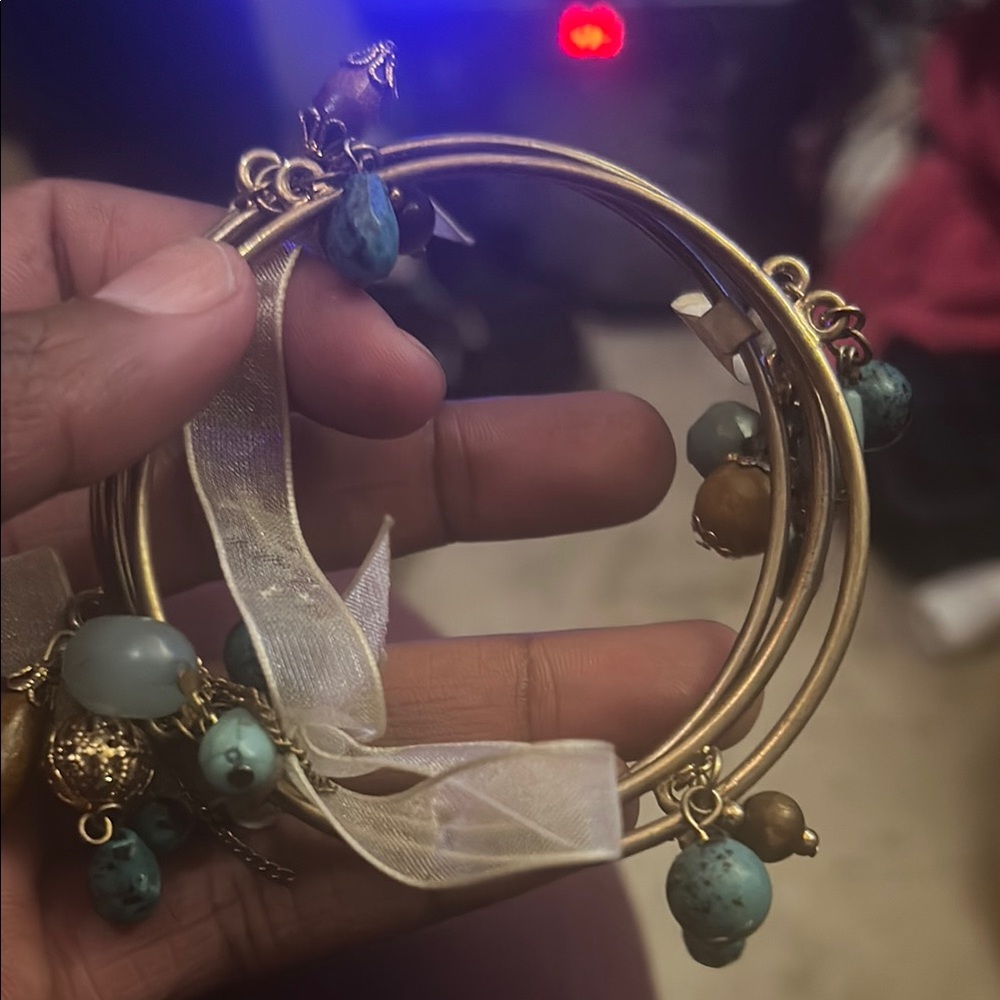 Gold and Blue Open Bangle with Turquoise Charms